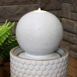 Sunnydaze Decor Modern Orb on Circle-Pattern Base Ceramic Outdoor Cascading Fountain with LEDs 14 Sunnydaze Decor Modern Orb on Circle-Pattern Base Ceramic Outdoor Cascading Fountain with LEDs -Sunnydaze Decor Sales sunnydaze decor freestanding fountains sss 734 76 1000