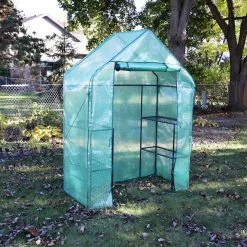 Sunnydaze Decor Sunnydaze 4 ft. x 2 ft. x 6 ft. Green Outdoor Portable Deluxe Walk-In Greenhouse with 4-Shelves -Sunnydaze Decor Sales sunnydaze decor portable greenhouses hgh 857 44 1000