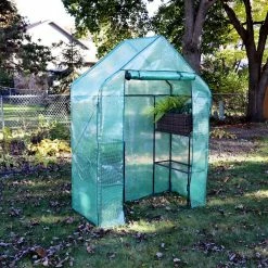 Sunnydaze Decor Sunnydaze 4 ft. x 2 ft. x 6 ft. Green Outdoor Portable Deluxe Walk-In Greenhouse with 4-Shelves -Sunnydaze Decor Sales sunnydaze decor portable greenhouses hgh 857 76 1000